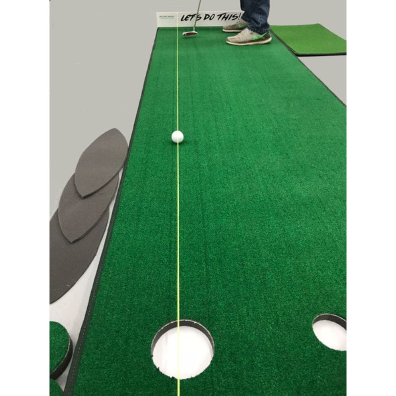 Big Moss Golf Michael Breed's "Let's Do This!" Training Green with a golfer practicing.