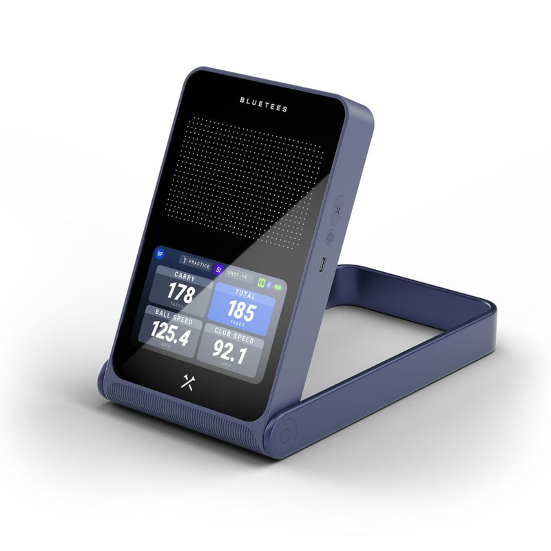 Blue Tees Rainmaker Launch Monitor angled studio view with practice data.