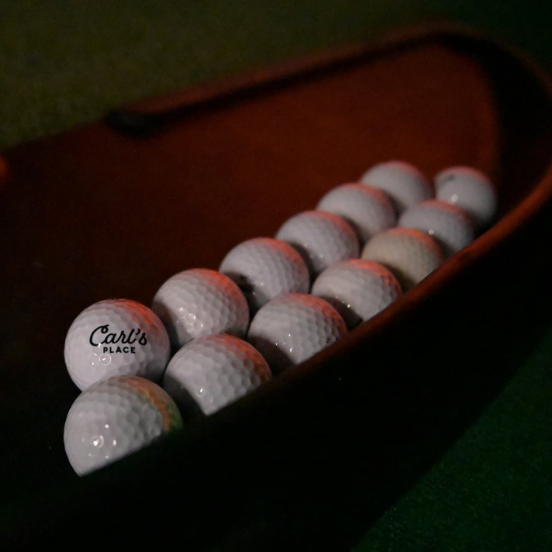 Carl's Place Golf Ball Tray close view with balls.