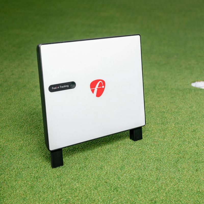 FlightScope XC3 Launch Monitor and Golf Simulator closeup of device on green turf.
