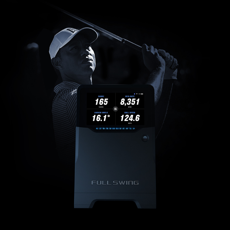 Full Swing KIT front view with Tiger Woods in background.