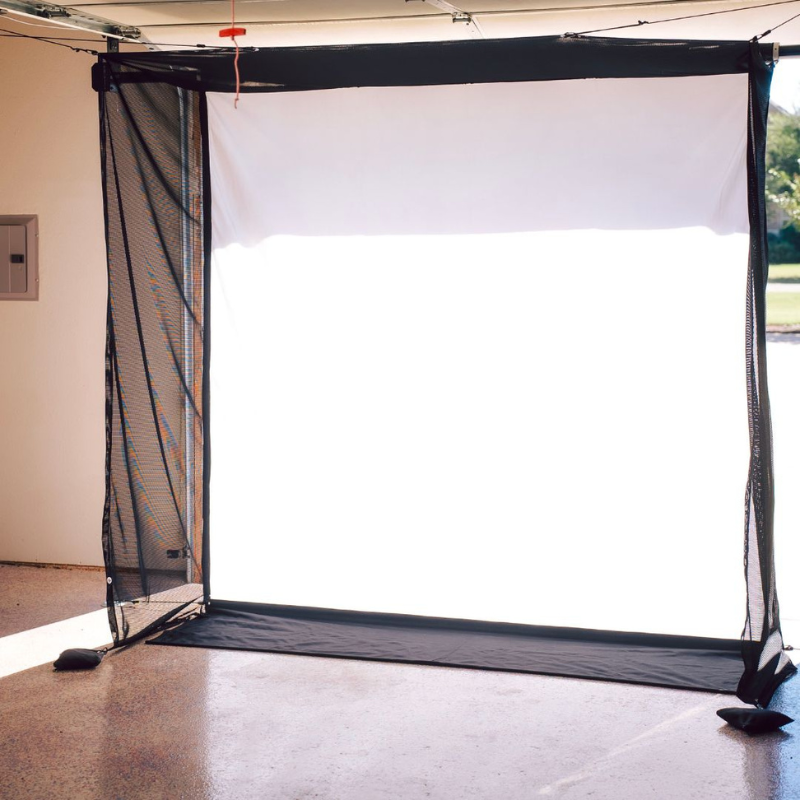 G-TRAK Retractable Impact Screen with garage door open.