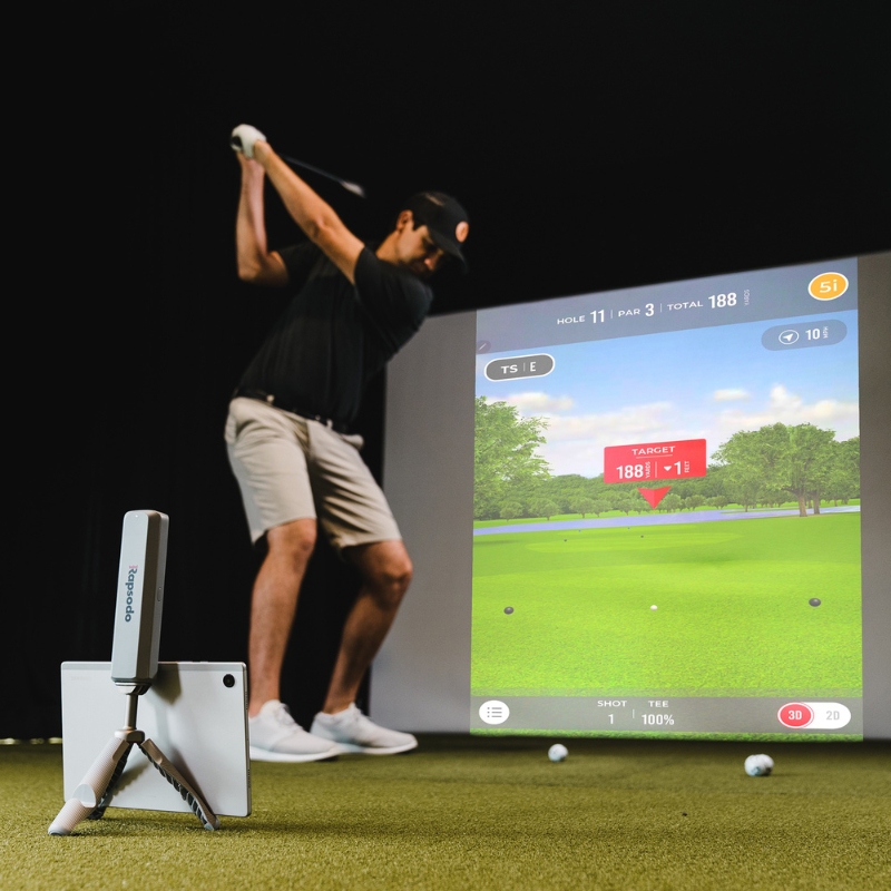 Rapsodo MLM2PRO being used inside a golf simulator.
