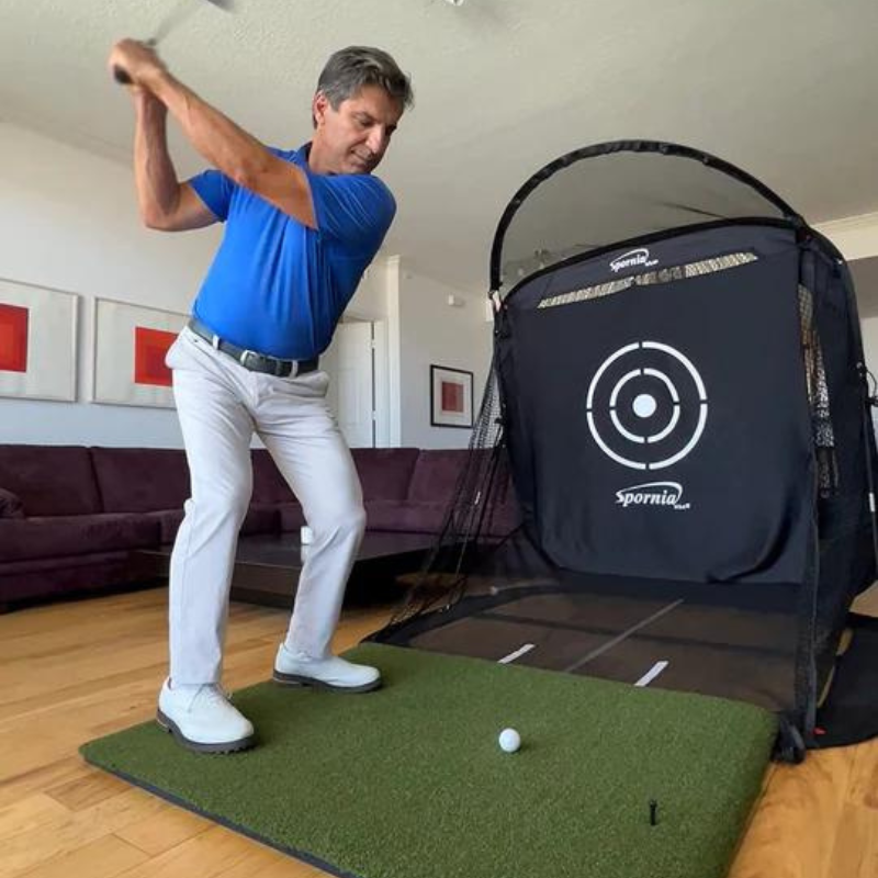 Spornia SPG Golf Practice Net with Spornia ProStrike Commercial Golf Mat 5'x5' and Golfer.