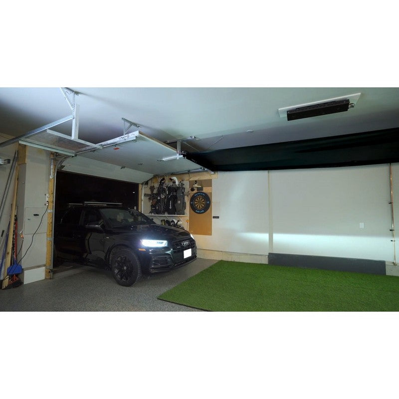 The SportsScreen Vanish Series Golf Simulator Enclosure car pulling in with the enclosure rolled up.